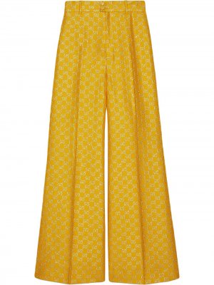 Широкие брюки из ткани ламе с узором GG Supreme Gucci. Цвет: желтый