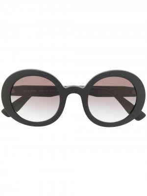 Солнцезащитные очки с градиентным эффектом в круглой оправе Miu Eyewear. Цвет: черный