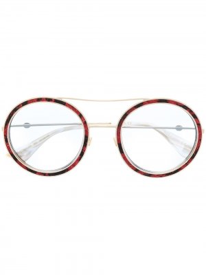 Солнцезащитные очки в круглой оправе Gucci Eyewear. Цвет: красный