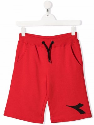 Спортивные шорты с логотипом Diadora Junior. Цвет: красный