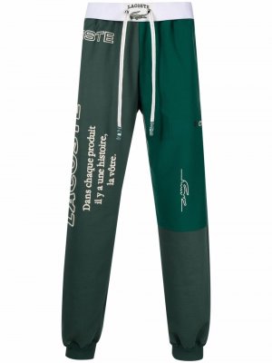 Спортивные брюки с вышитым логотипом и вставками Lacoste. Цвет: зеленый