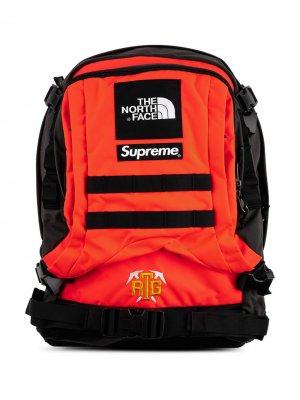 Рюкзак из коллаборации с  North Face Supreme. Цвет: красный