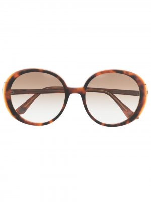 Солнцезащитные очки в круглой оправе черепаховой расцветки Emmanuelle Khanh. Цвет: коричневый