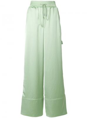 Атласные широкие брюки Off-White. Цвет: зеленый
